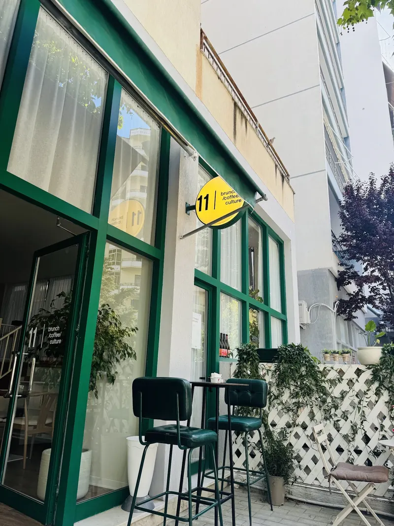 The storefront and outdoor seating on Rruga Cajupi